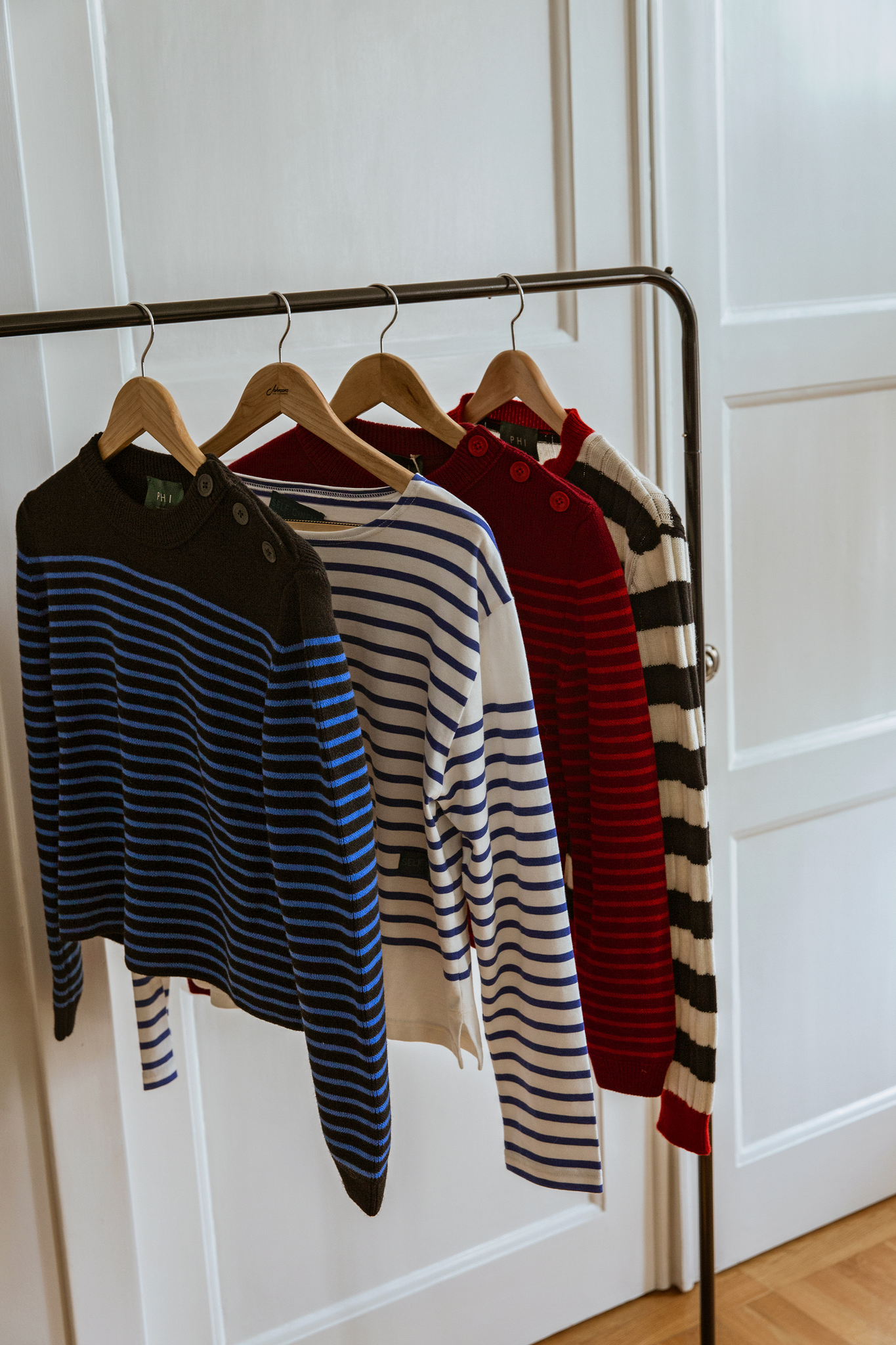 Rack with Sustainable Knitwear with stripes